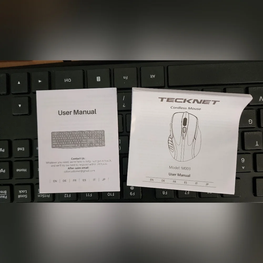 Wireless Keyboard Is Black andTECK NET Mouse Is Black and Purple U Get Both